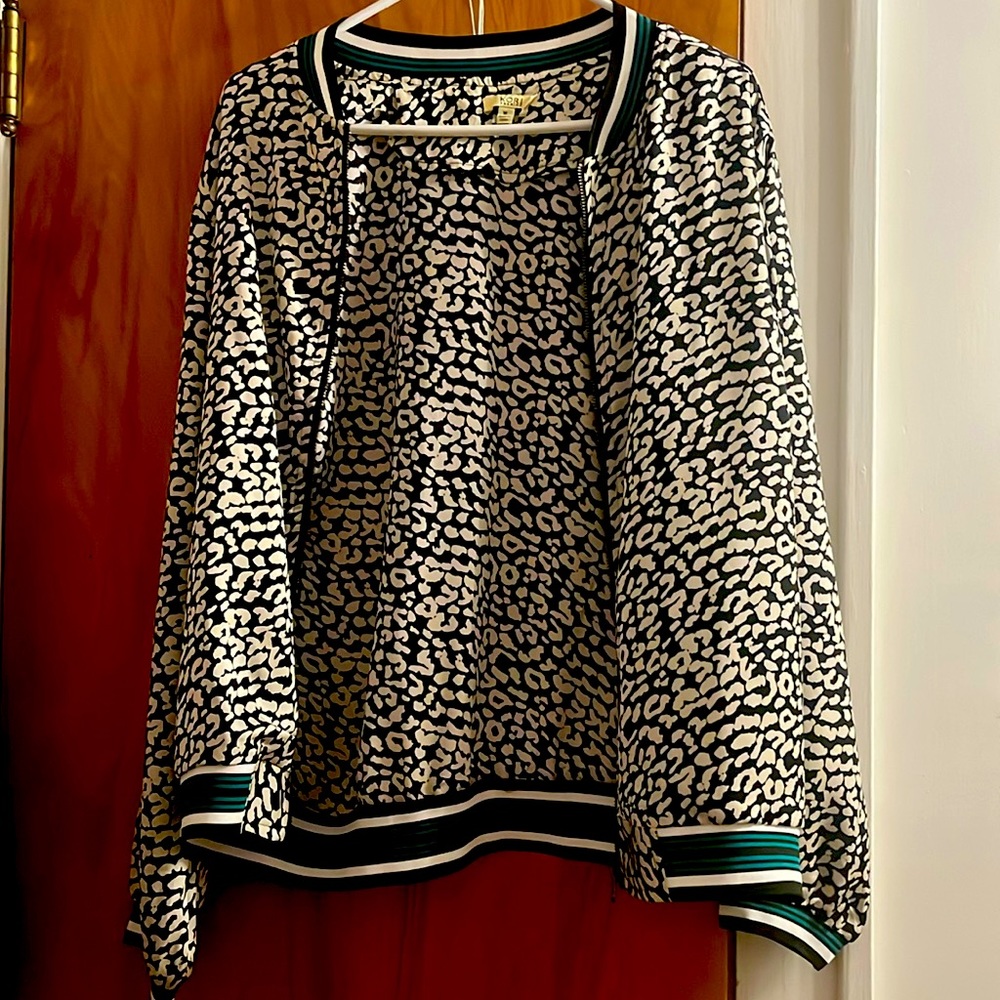 Leopard print track jacket, size medium, has pockets